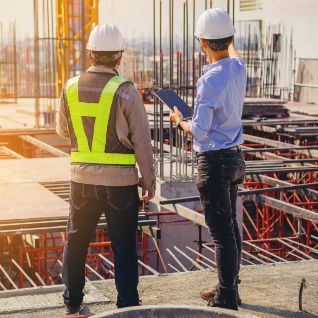 two people looking at a construction site 