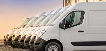Vans in a line