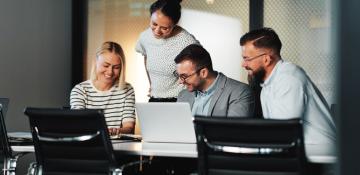 Four office workers having a meeting
